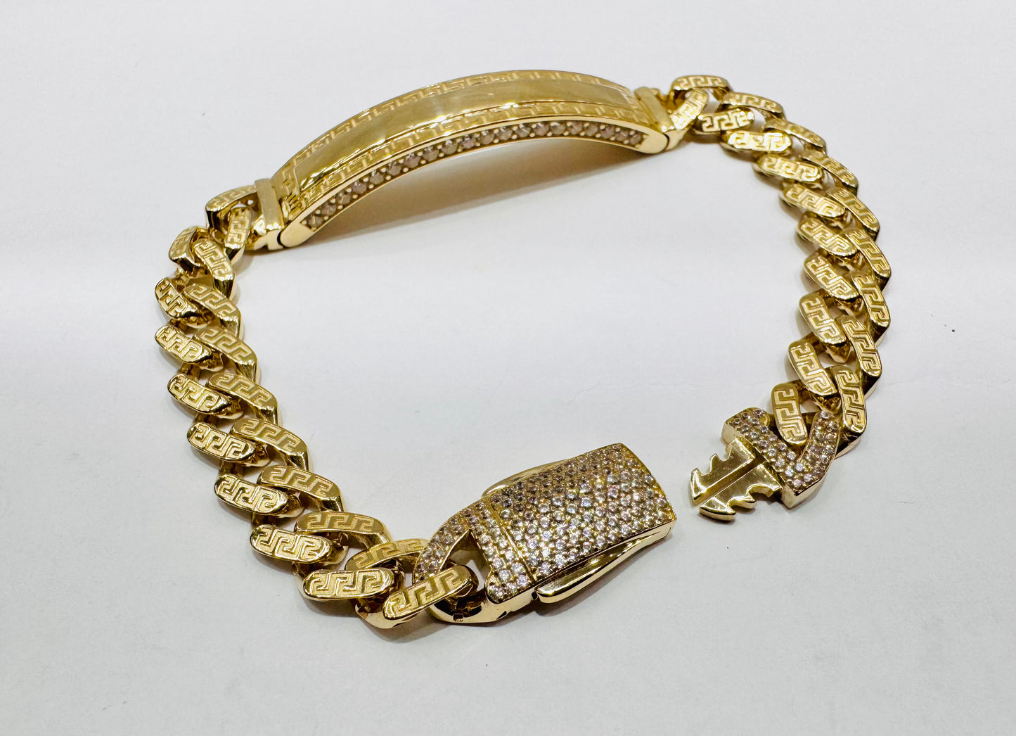 10K GOLD MONACO ID BRACELET WITH VERSACE DESIGN 8”, WIDTH: 9mm, WEIGHT: 14.1gm