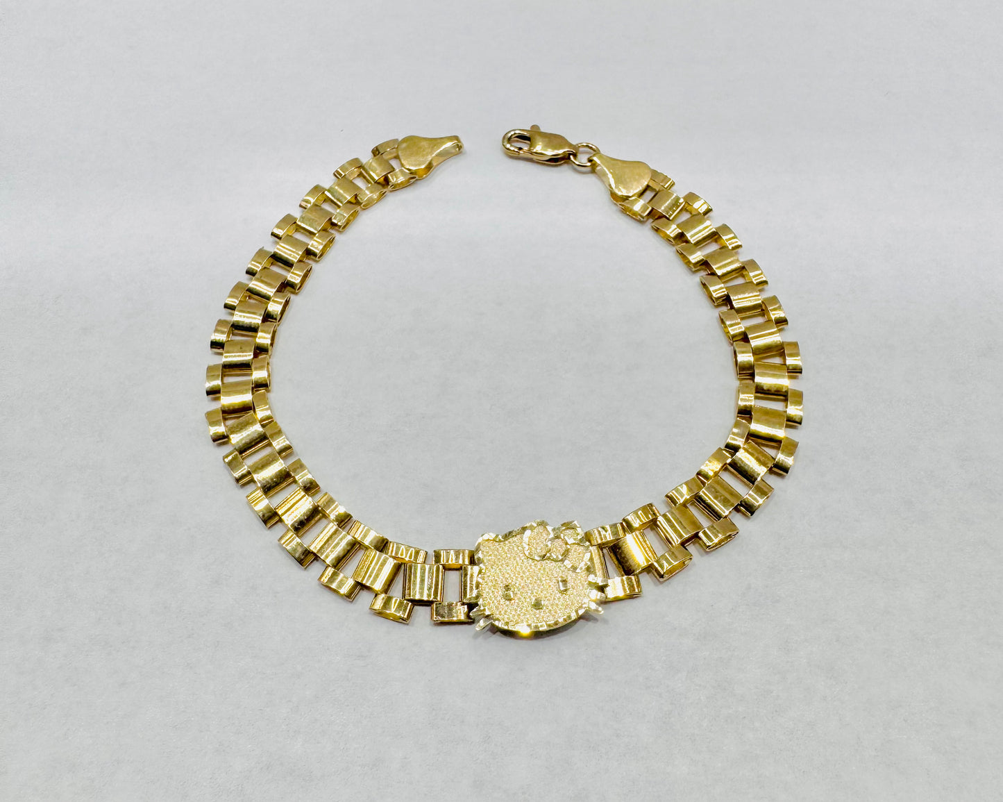 10K GOLD SMALL HELLO KITTY FACE BRACELET 8”, WEIGHT: 9.2gm