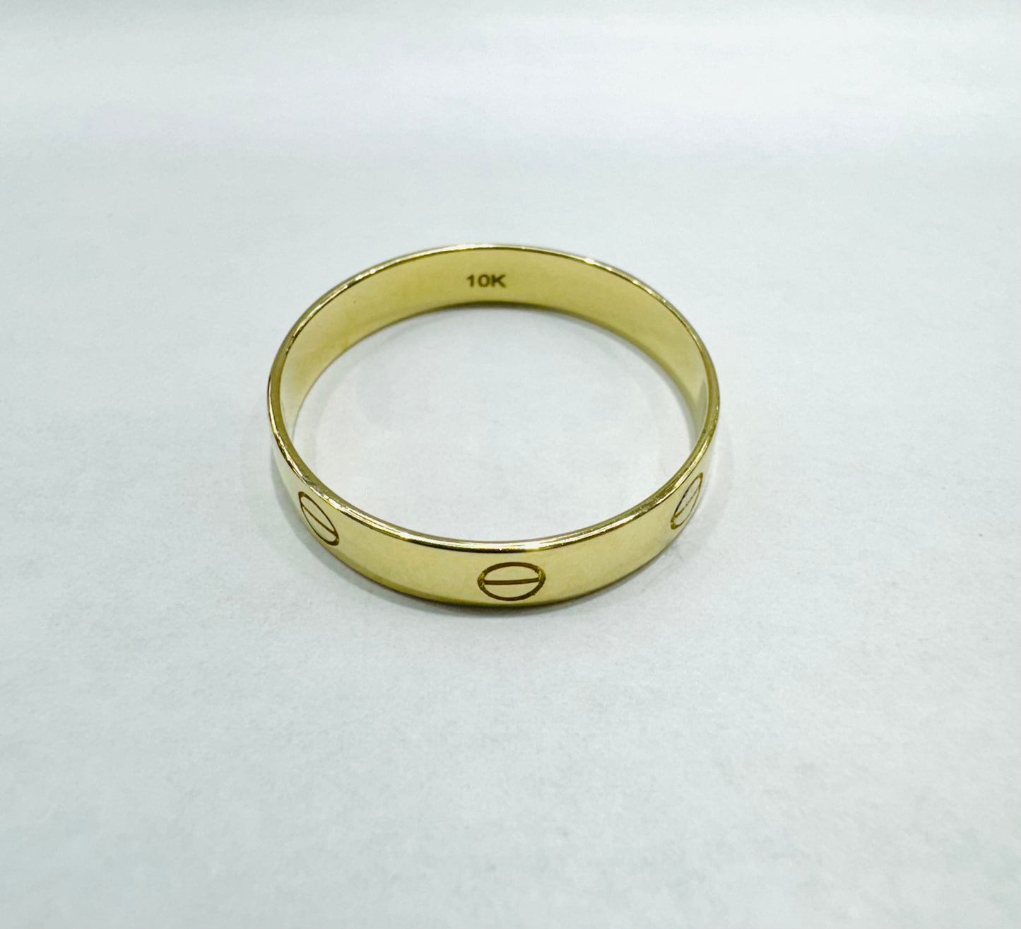 10K GOLD CARTIER BAND, WEIGHT: 2gm, SIZE: 10