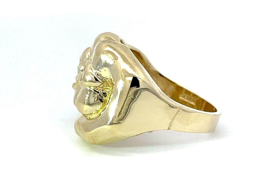 10K GOLD FIST RING- Weight: 10.5gm