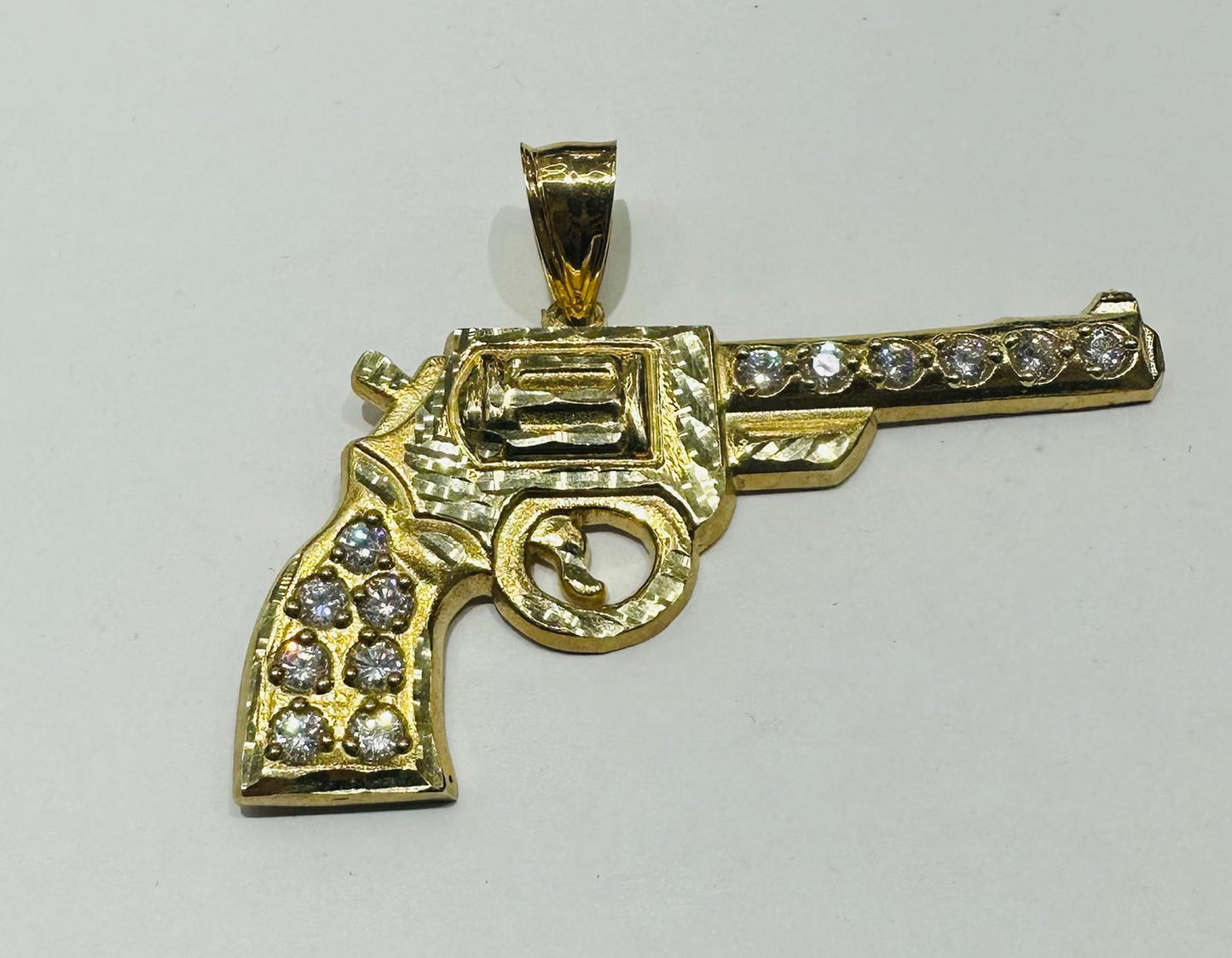 10K GOLD CZ GUN PENDANT, WEIGHT: 9.3gm