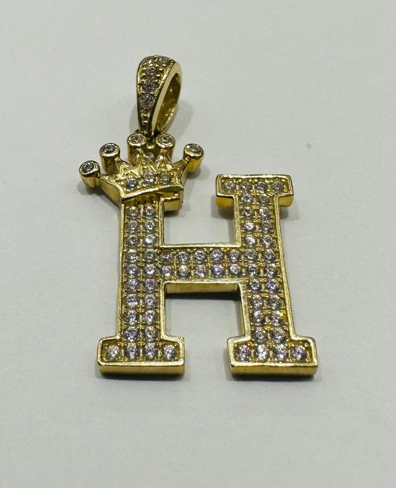 10K GOLD CZ STONE INITIAL LETTER "H" WITH A CROWN PENDANT- WEIGHT: 2.5gm