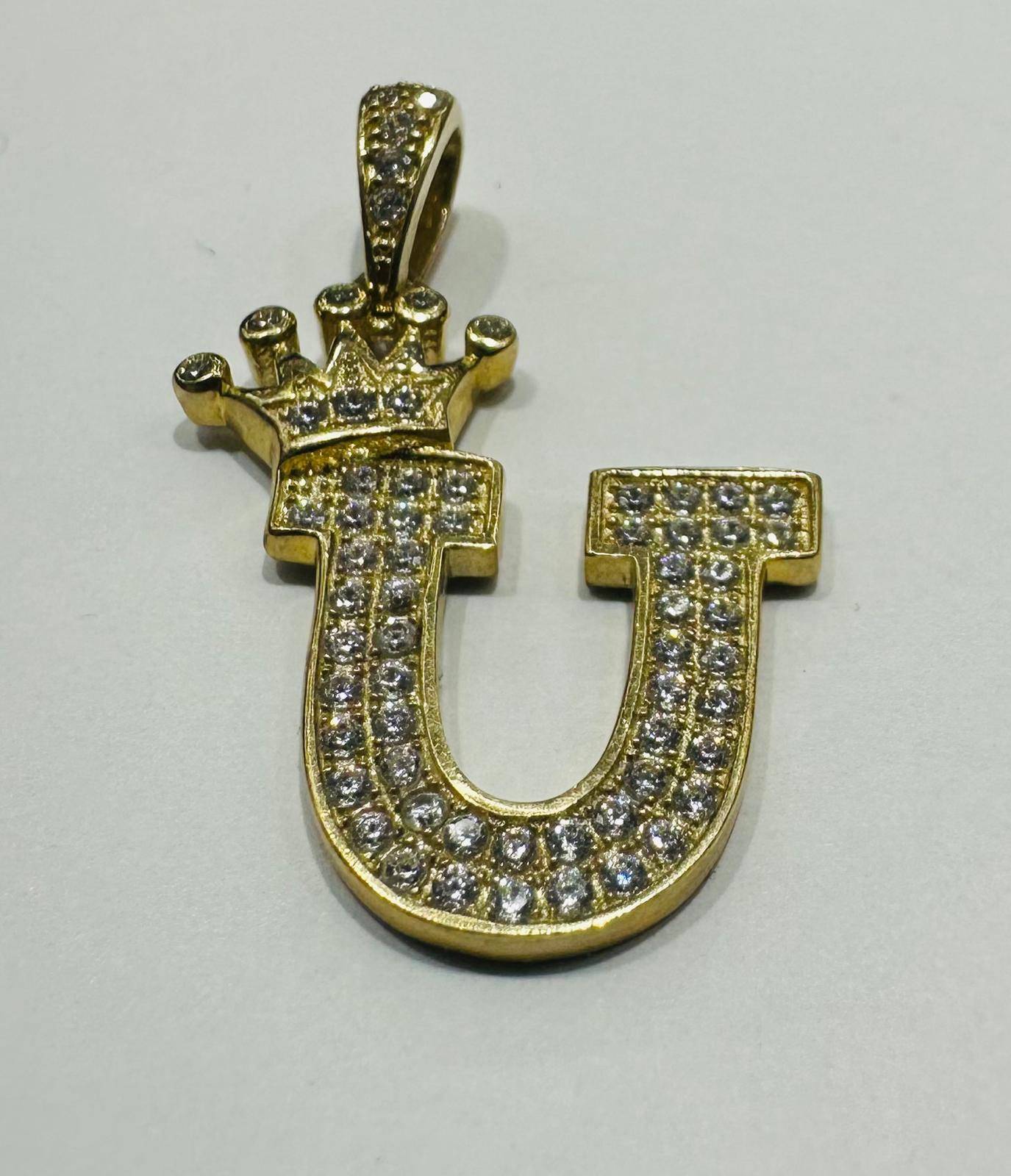 10K GOLD CZ STONE INITIAL LETTER "U" WITH A CROWN PENDANT- WEIGHT: 2.8gm