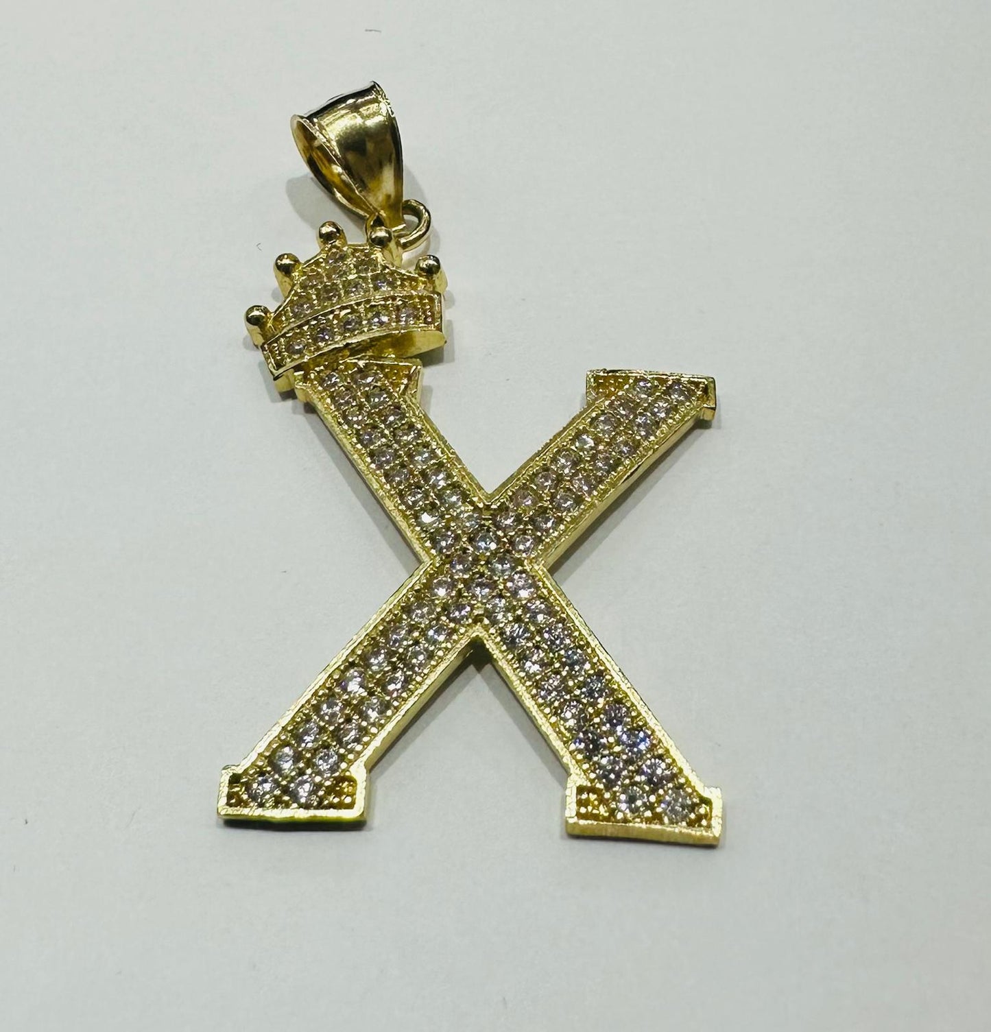 10K GOLD CZ STONE INITIAL LETTER "X" WITH A CROWN PENDANT- WEIGHT: 4.1gm
