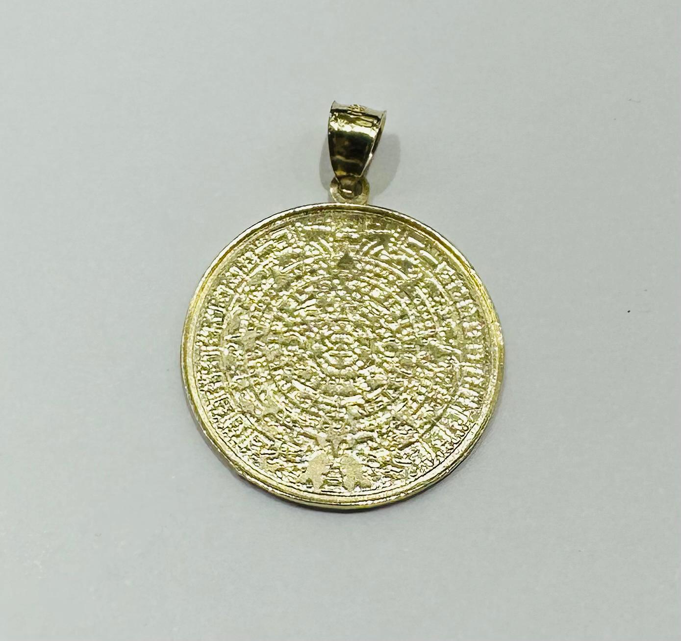 10K GOLD AZTEC CALENDER PENDANT- WEIGHT: 2.5gm