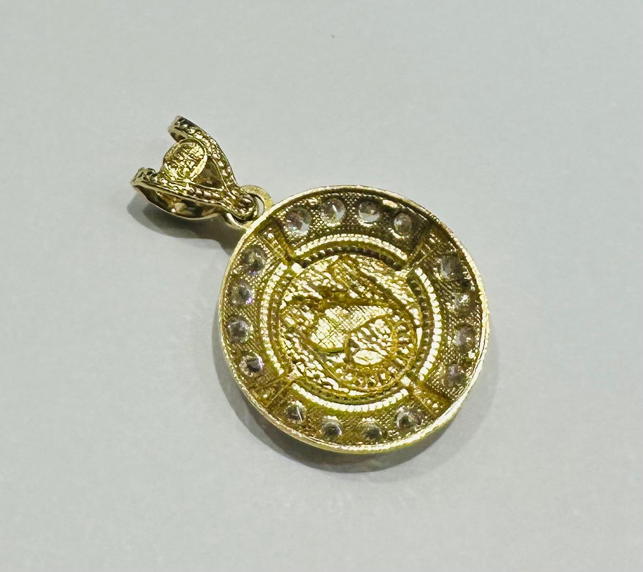10K GOLD HORSESHOE PENDANT- WEIGHT: 4.5gm