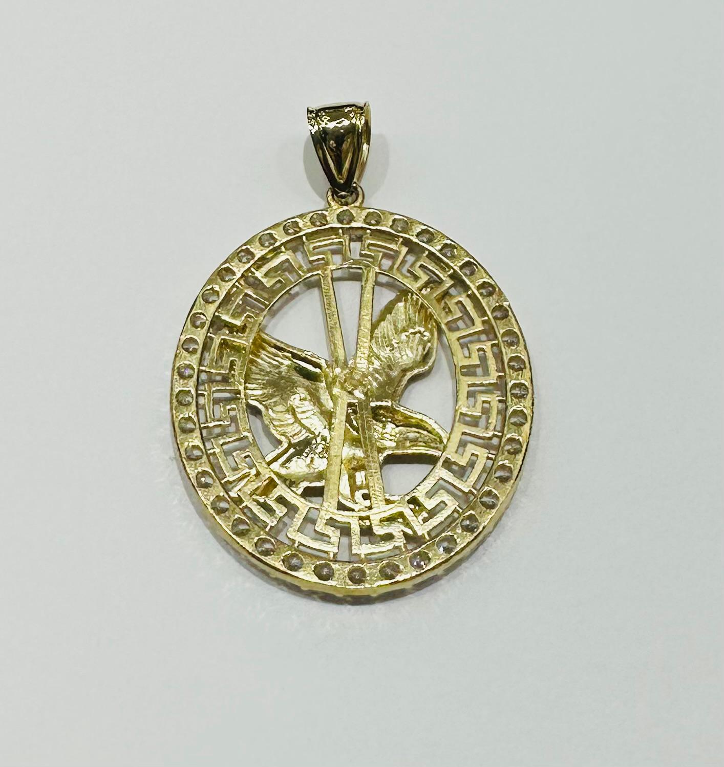 10K GOLD EAGLE PENDANT WITH WHITE SAPPHIRE- WEIGHT: 10.2gm