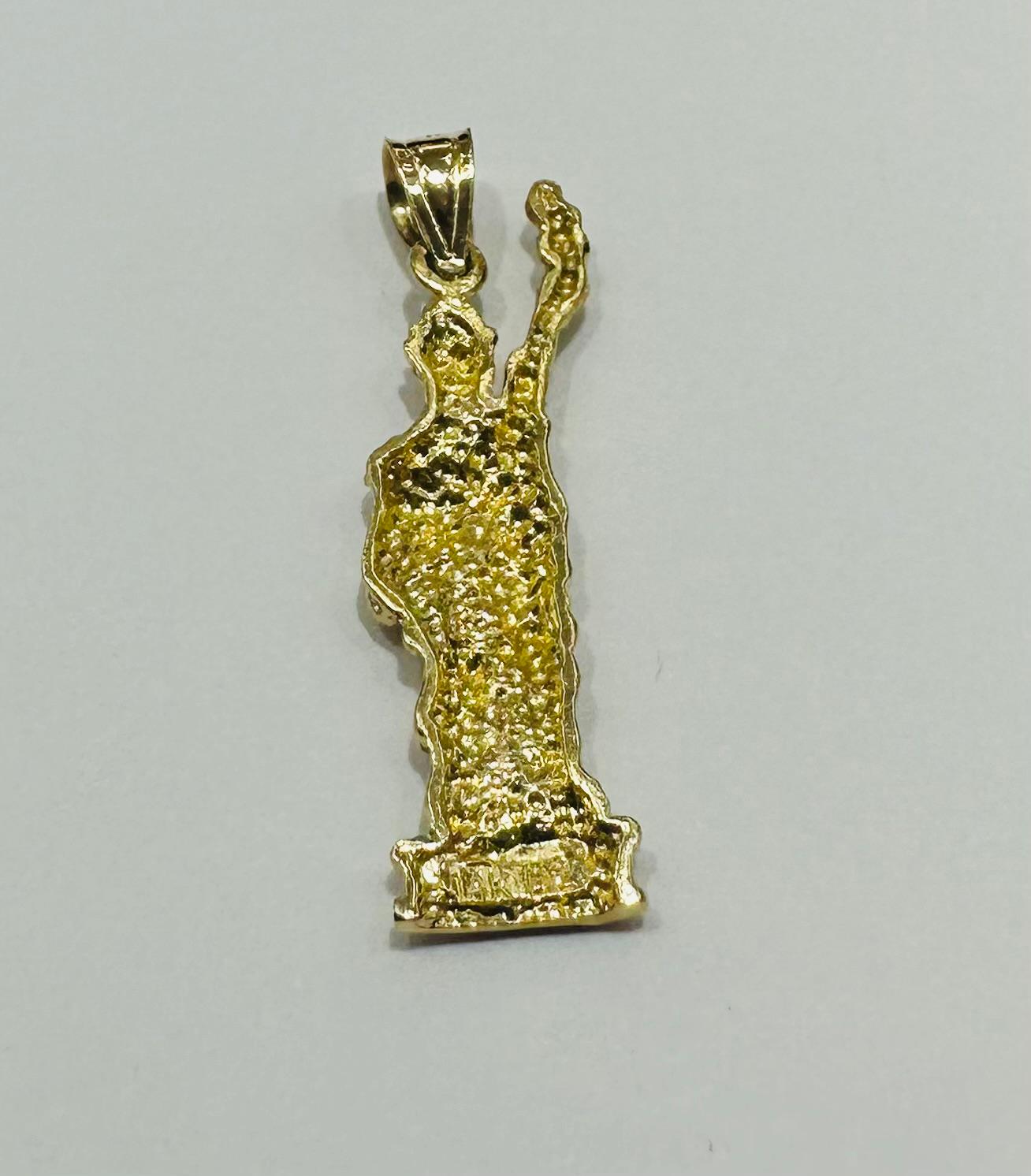 10K GOLD STATUE OF LIBERTY PENDANT- WEIGHT: 2.1gm