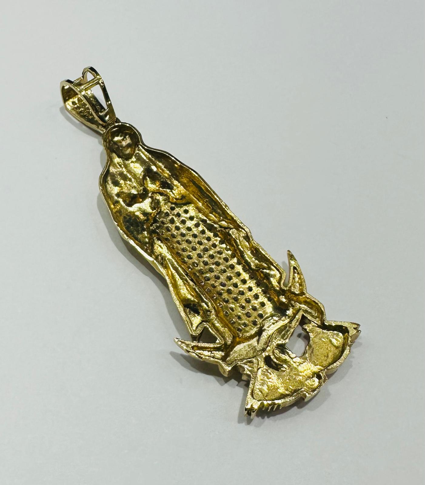 10K GOLD VIRGIN MARY PENDANT WITH SAPPHIRE STONES- WEIGHT: 9.5gm