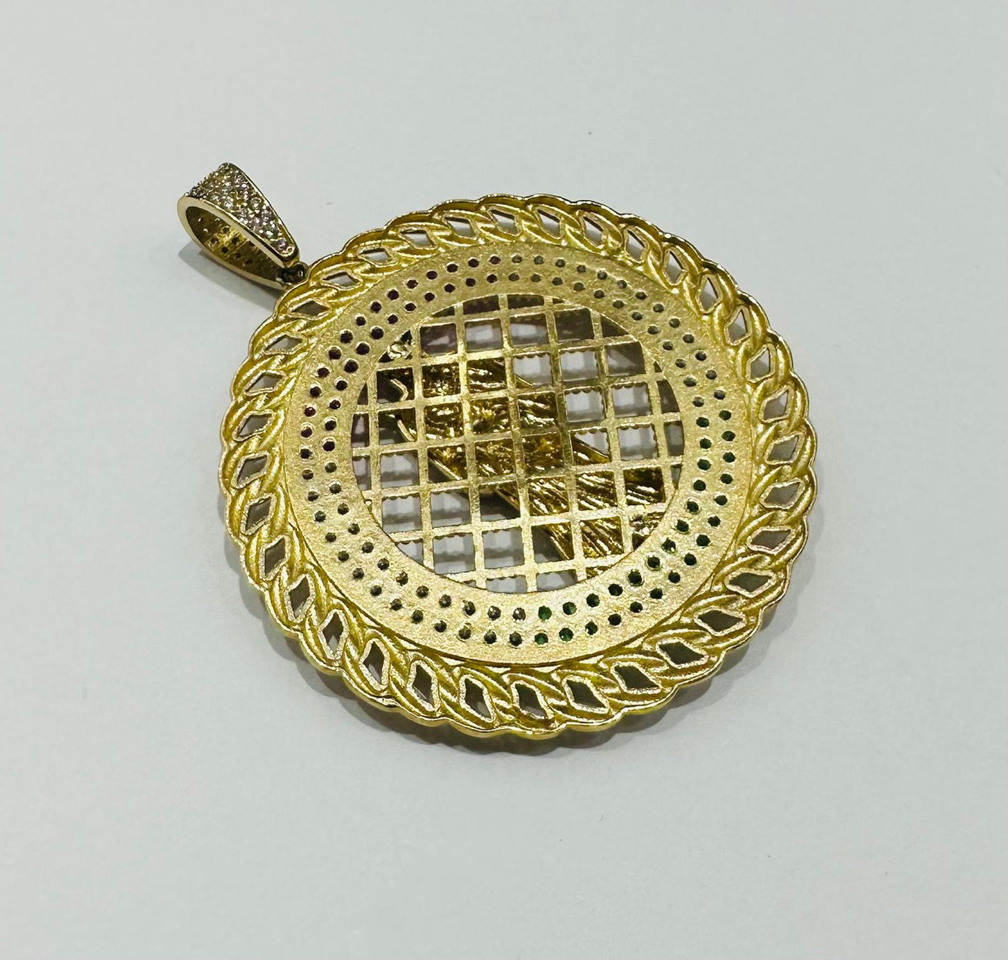 10K GOLD SANTA MUERTE PENDANT WITH SAPPHIRE STONES- WEIGHT: 10.5gm
