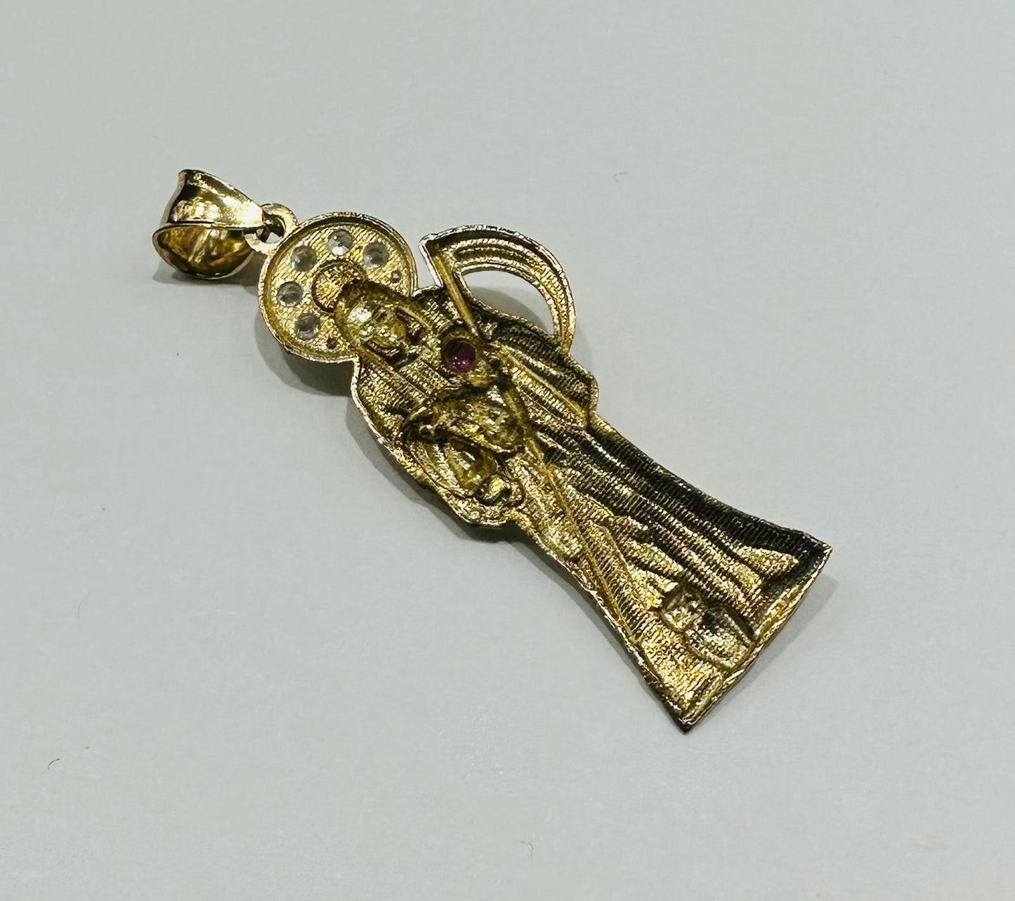 10K GOLD SANTA MUERTE PENDANT WITH SAPPHIRE STONES- WEIGHT: 3.0gm