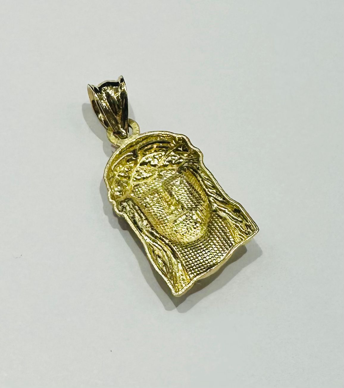 10K GOLD JESUS FACE PENDANT- WEIGHT: 1.0gm