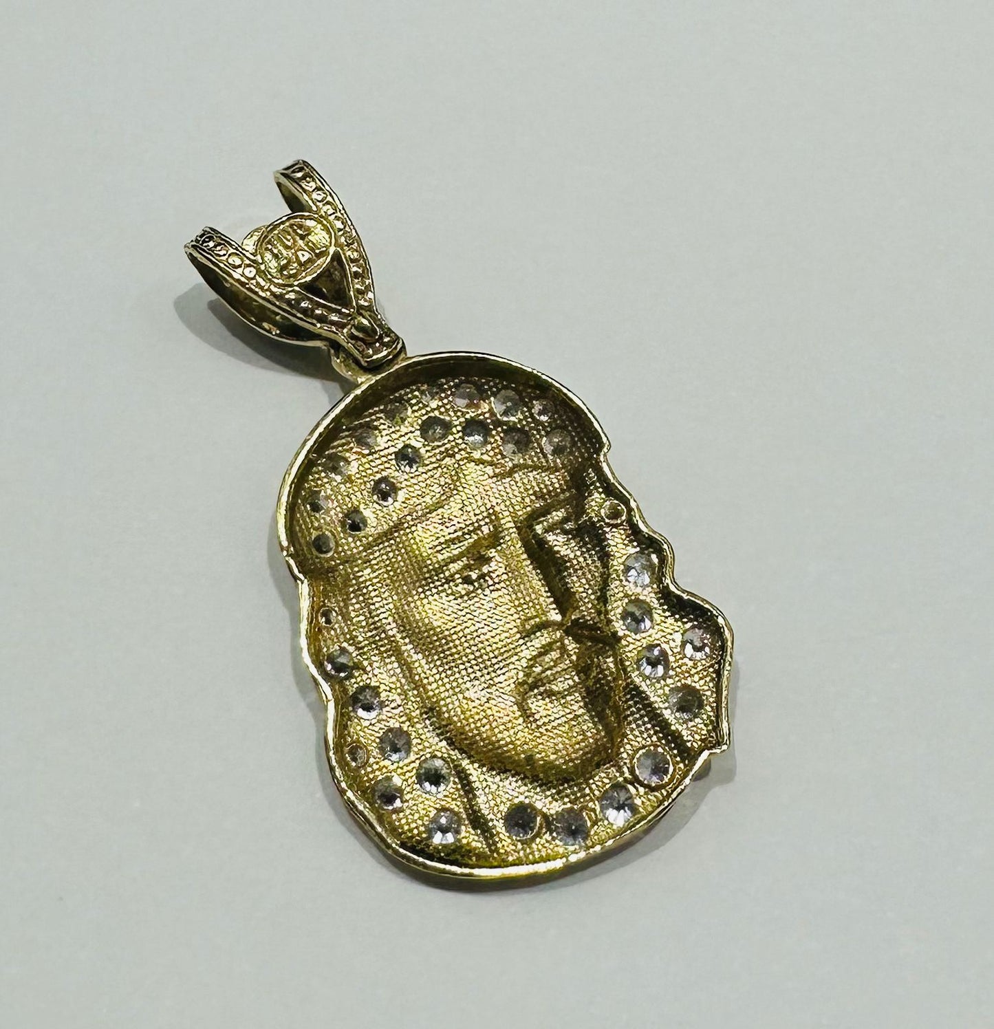 10K GOLD JESUS FACE PENDANT WITH WHITE SAPPHIRE- WEIGHT: 3.5gm