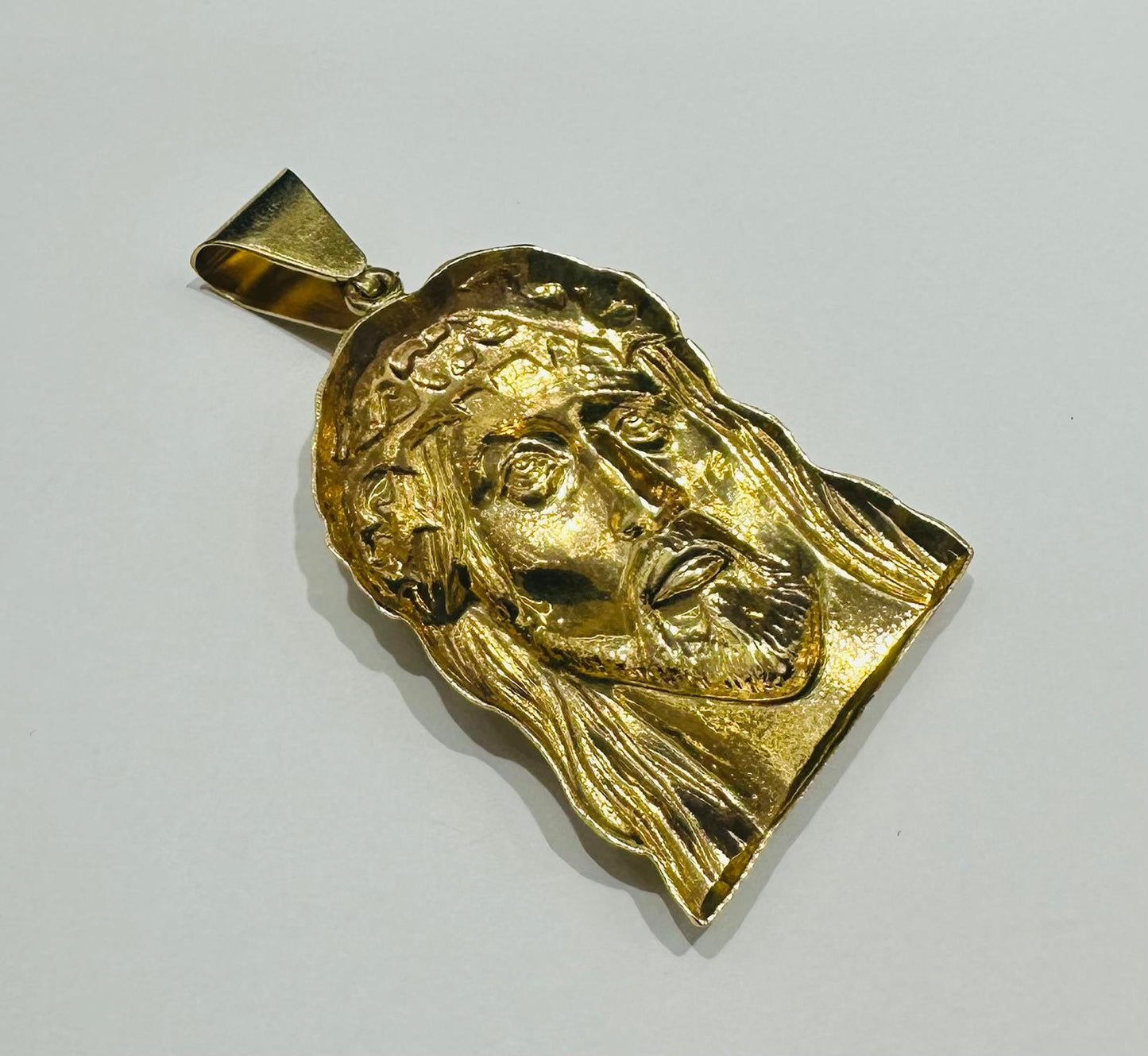 10K GOLD JESUS FACE PENDANT WITH WHITE SAPPHIRE- WEIGHT: 14.3gm