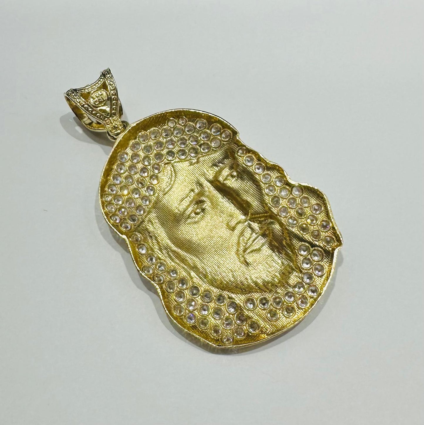 10K GOLD JESUS PENDANT WITH WHITE SAPPHIRE- WEIGHT: 12.9gm