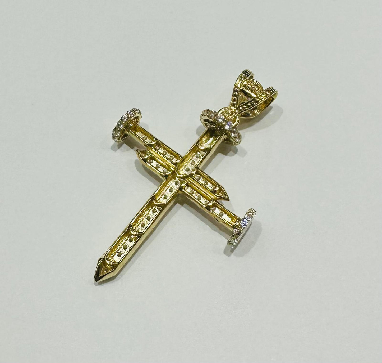 10K GOLD CROSS NAIL PENDANT WITH WHITE SAPPHIRE- WEIGHT: 5.3gm