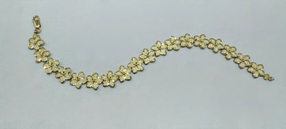10K GOLD HIBISCUS FLOWER BRACELET 7”, WEIGHT: 11.4gm