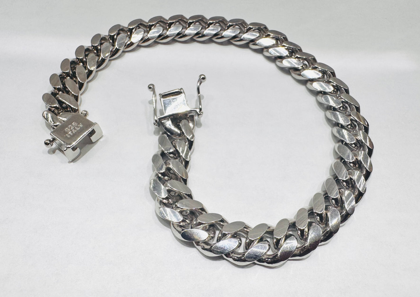 SILVER SOLID MIAMI CUBAN BRACELET 9.5”, WEIGHT: 51.8gm, WIDTH: 6mm