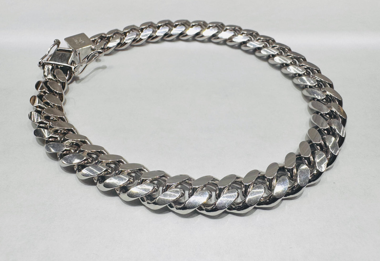 SILVER SOLID MIAMI CUBAN BRACELET 9.5”, WEIGHT: 51.8gm, WIDTH: 6mm