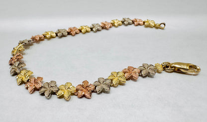 10K GOLD THREE TONE HIBISCUS FLOWER BRACELET 7”, WEIGHT: 6.2gm