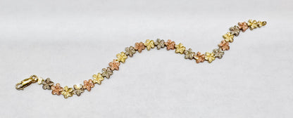 10K GOLD THREE TONE HIBISCUS FLOWER BRACELET 7”, WEIGHT: 6.2gm