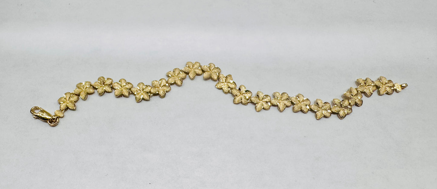 10K GOLD HIBISCUS FLOWER BRACELET, WEIGHT: 6.1gm
