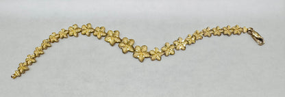 10K GOLD HIBISCUS FLOWER BRACELET, WEIGHT: 6.5gm