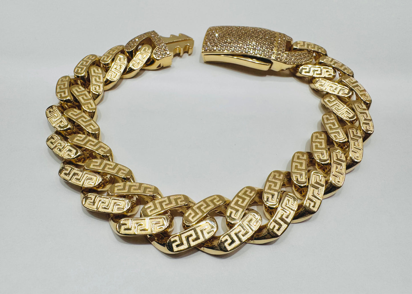 10K GOLD MONACO BRACELET WITH VERSACE BORDER 9.5”, WIDTH: 14.3mm, WEIGHT: 26gm