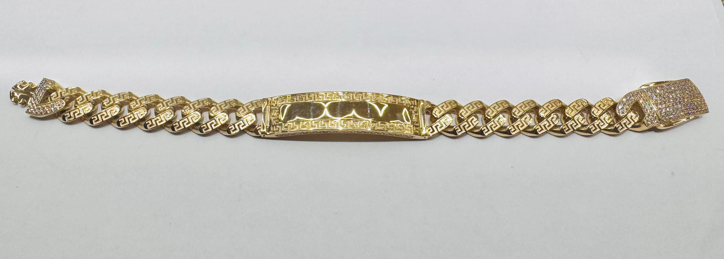 10K GOLD MONACO ID BRACELET WITH VERSACE DESIGN 9.5”, WIDTH: 13mm, WEIGHT: 27gm