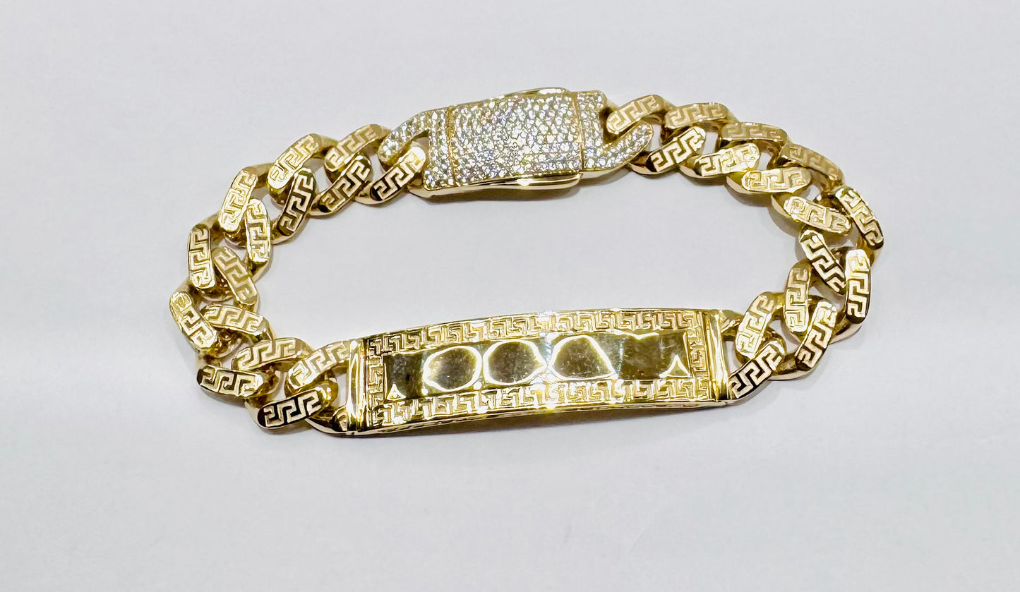 10K GOLD MONACO ID BRACELET WITH VERSACE DESIGN 9.5”, WIDTH: 13mm, WEIGHT: 27gm