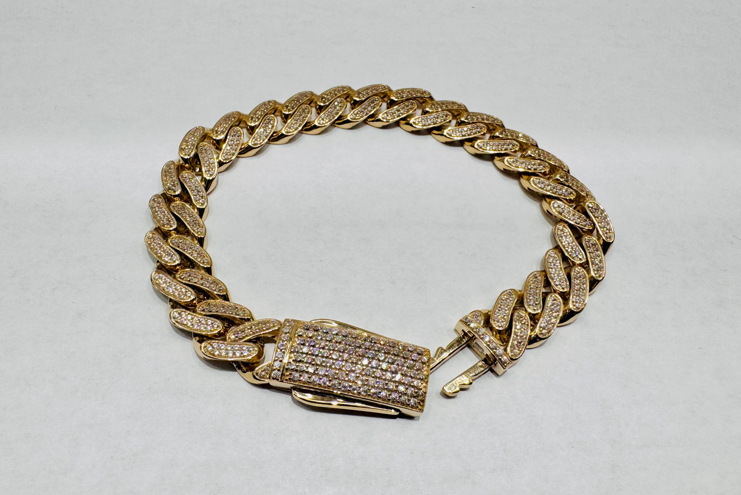 10K GOLD CZ CUBAN LINK BRACELET 9”, WIDTH: 11mm, WEIGHT: 22.5gm