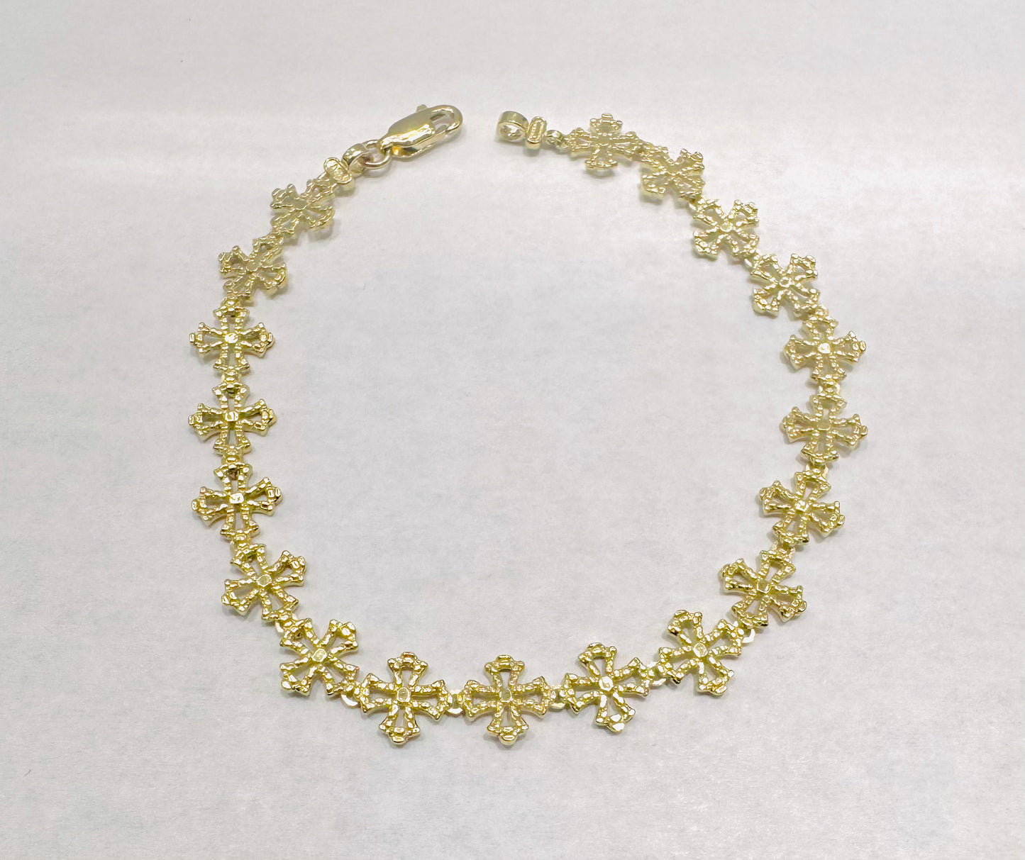 10K GOLD CROSS BRACELET 7.5”, WEIGHT: 5.7gm