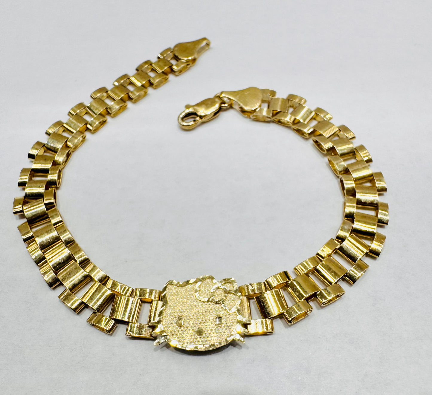 10K GOLD SMALL HELLO KITTY FACE BRACELET 8”, WEIGHT: 9.2gm
