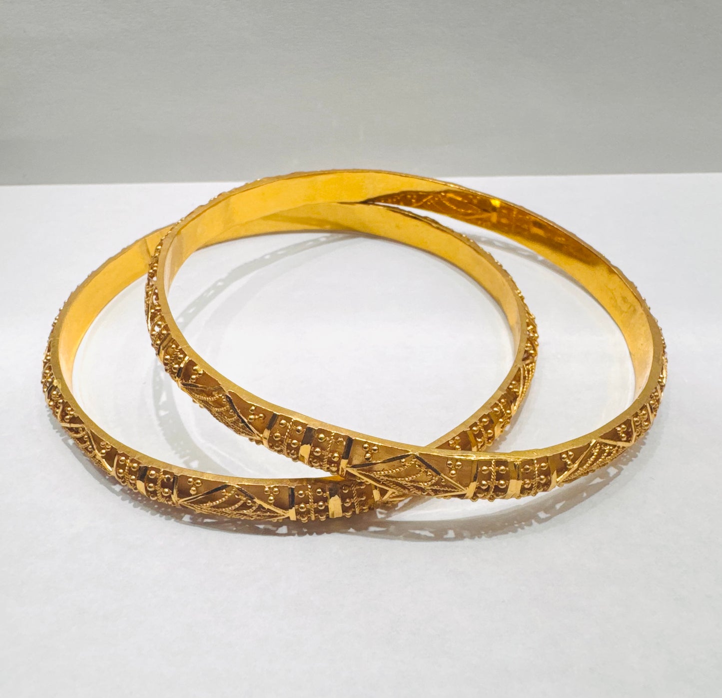 21K GOLD BANGLES, WEIGHT: 21.8gm
