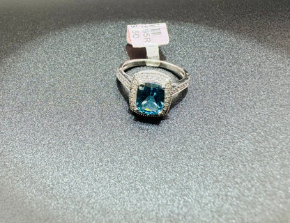 SILVER RING WITH SKY BLUE TOPAZ SWAROVSKI STONES, SIZE: 8, WEIGHT:  4.5gm