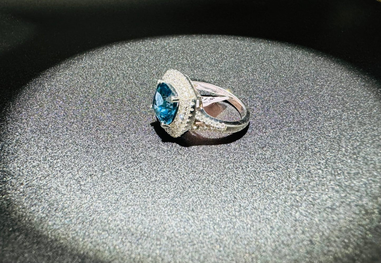 SILVER RING WITH BLUE TOPAZ AND WHITE SWAROVSKI STONES, SIZE: 7, WEIGHT: 5.4gm