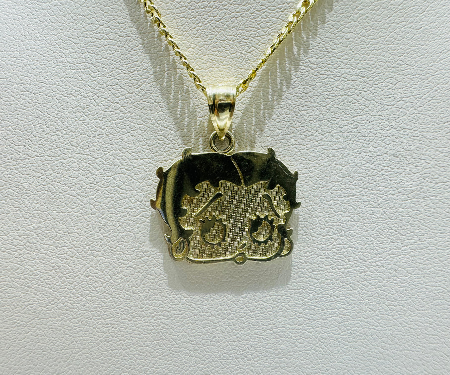 10K GOLD CUBAN LINK NECKLACE 24”, WEIGHT: 1.8gm, WIDTH: 1.89mm AND BETTY BOOP PENDANT, WEIGHT: 1.9gm