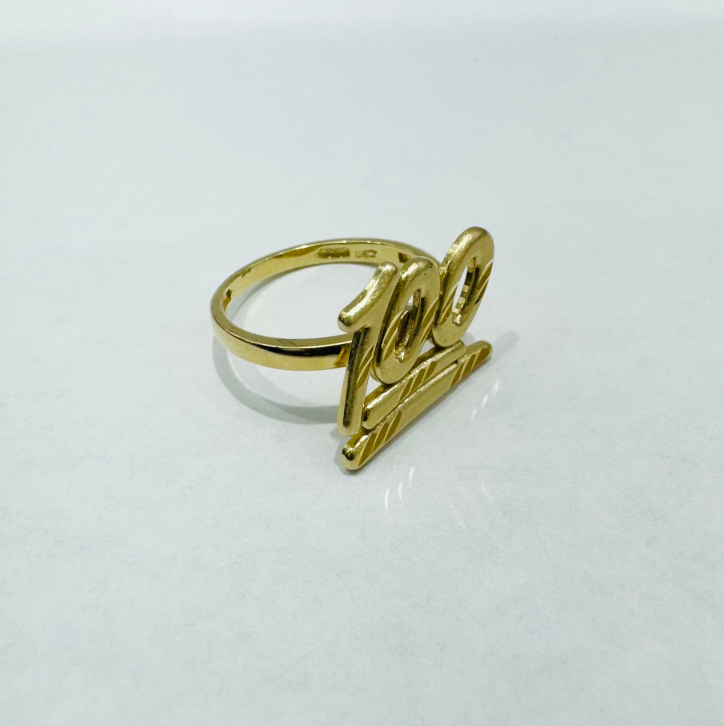 10K GOLD CUSTOM 100 RING, WEIGHT: 2.5gm, SIZE: 7