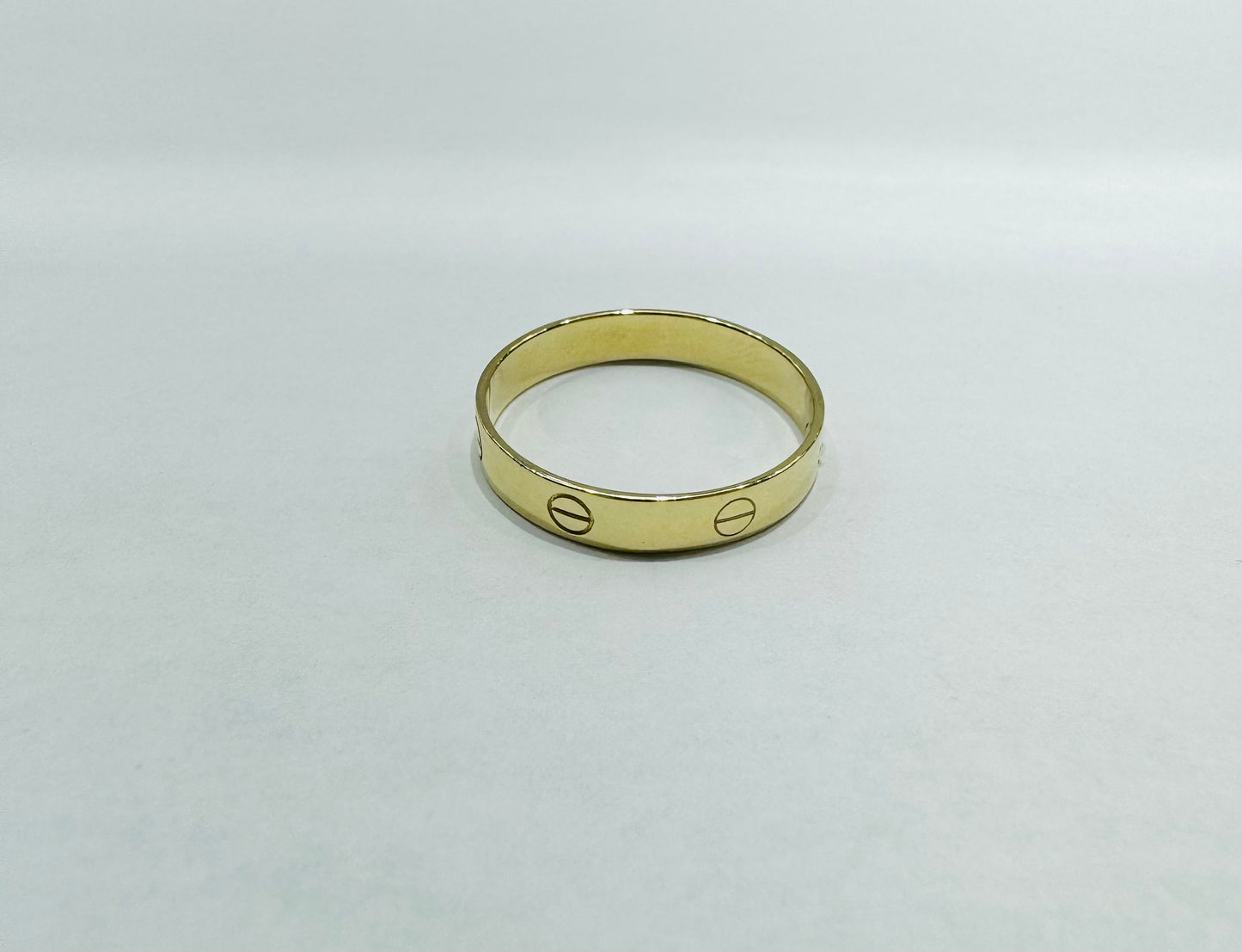 10K GOLD CARTIER BAND, WEIGHT: 2gm, SIZE: 10