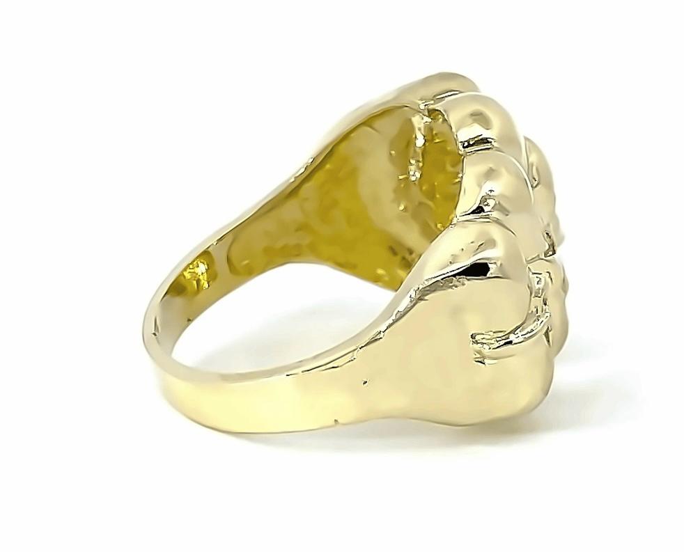 10K GOLD FIST RING- Weight: 10.5gm
