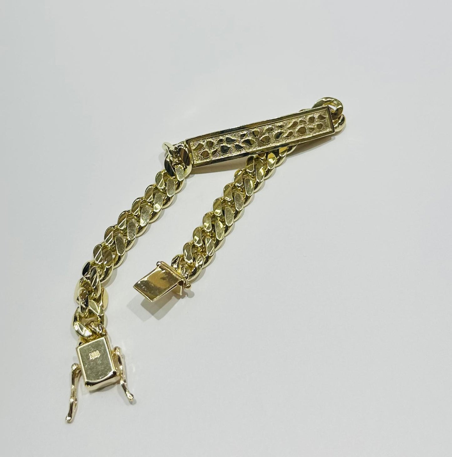 10k GOLD MIAMI CUBAN BRACELET WITH NUGGET ID 9" 8.8mm, WEIGHT: 46.4gm