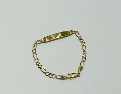 10K GOLD FIGARO BABY ID BRACELET 6" 1.35mm, Weight: 3.5gm