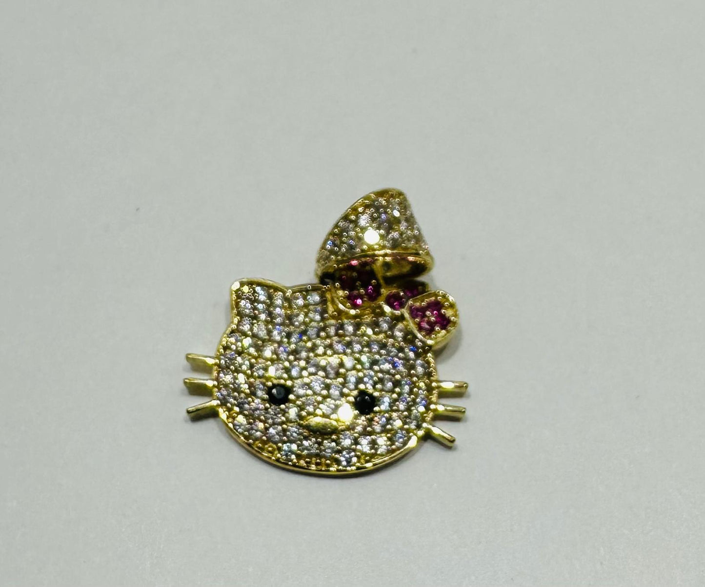 10K GOLD HELLO KITTY PENDANT WITH STONES 2 gm