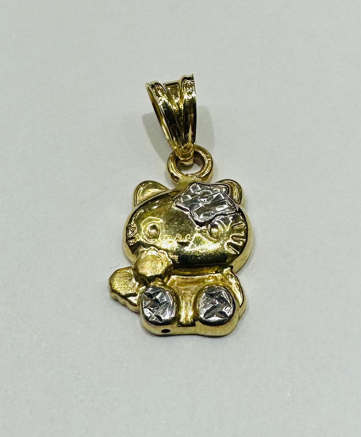 10K GOLD HELLO KITTY SMALL BODY PENDANT, 0.8 gm