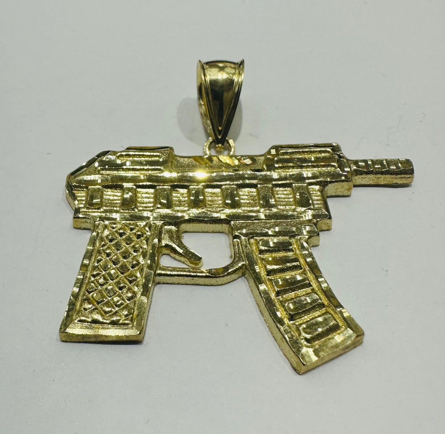 10K GOLD GUN PENDANT, WEIGHT: 9.0gm