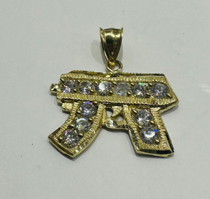 10K GOLD CZ GUN PENDANT, WEIGHT: 4.4gm