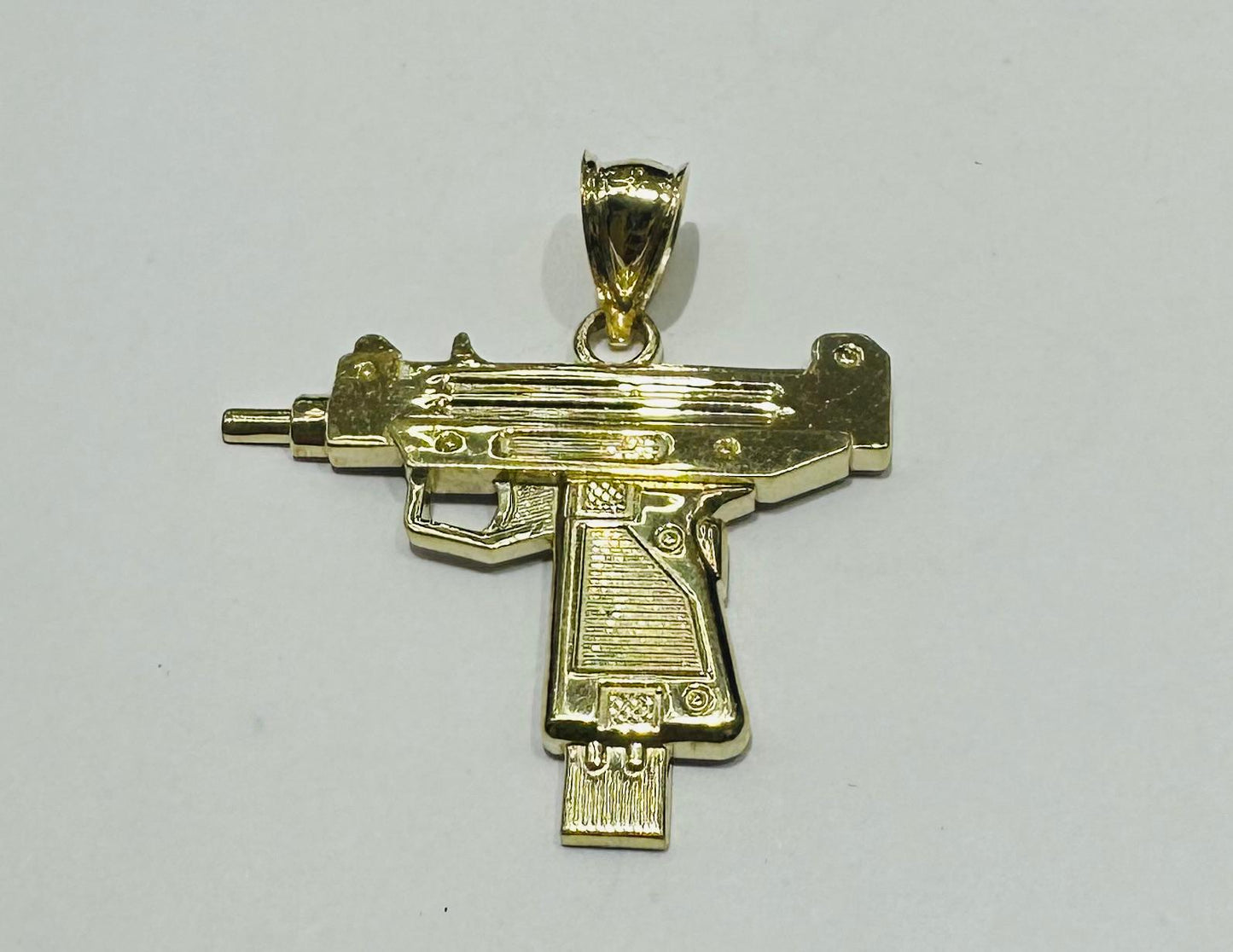 10K GOLD GUN PENDANT, WEIGHT: 2.2gm