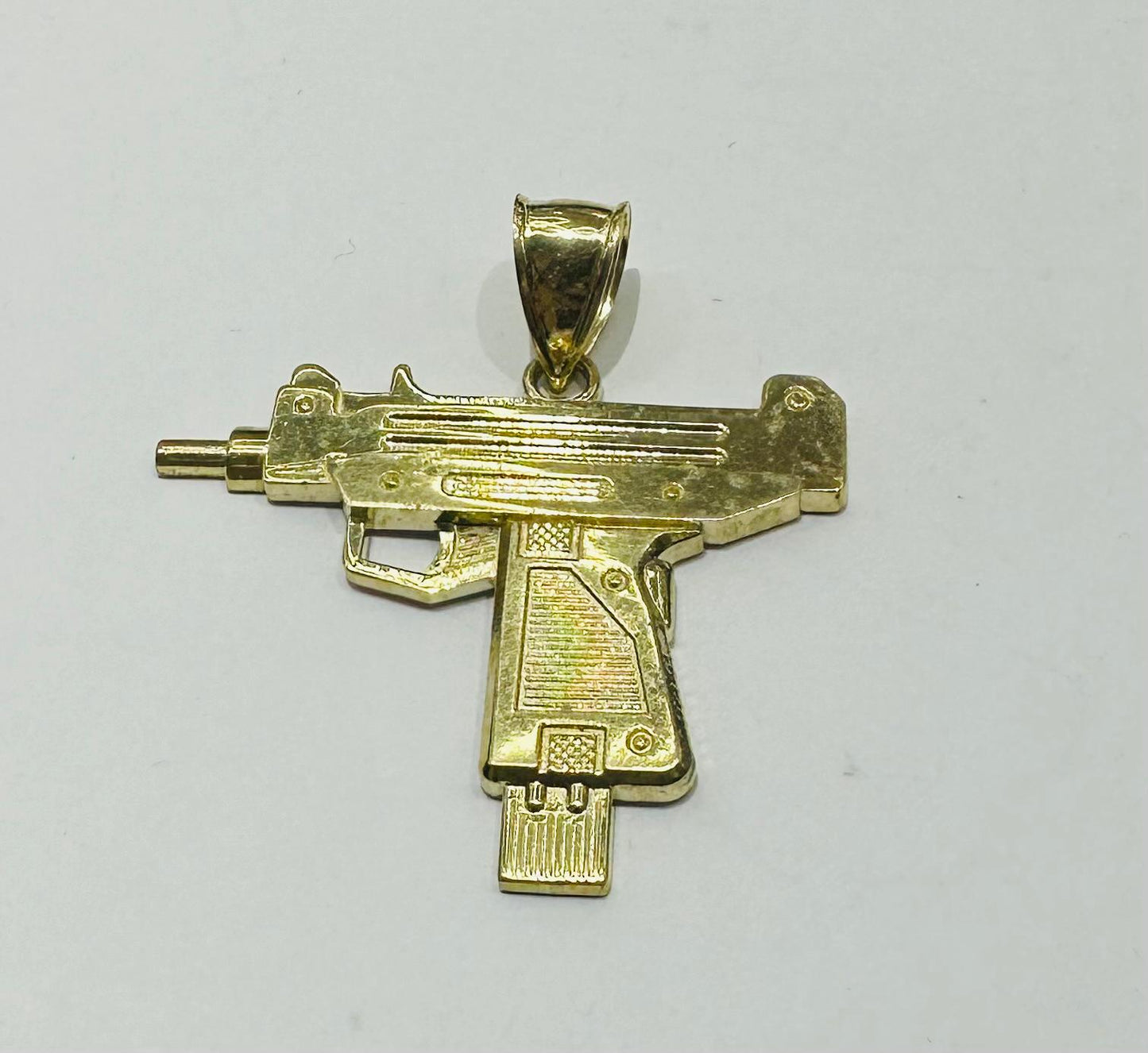 10K GOLD GUN PENDANT, WEIGHT: 4.0gm