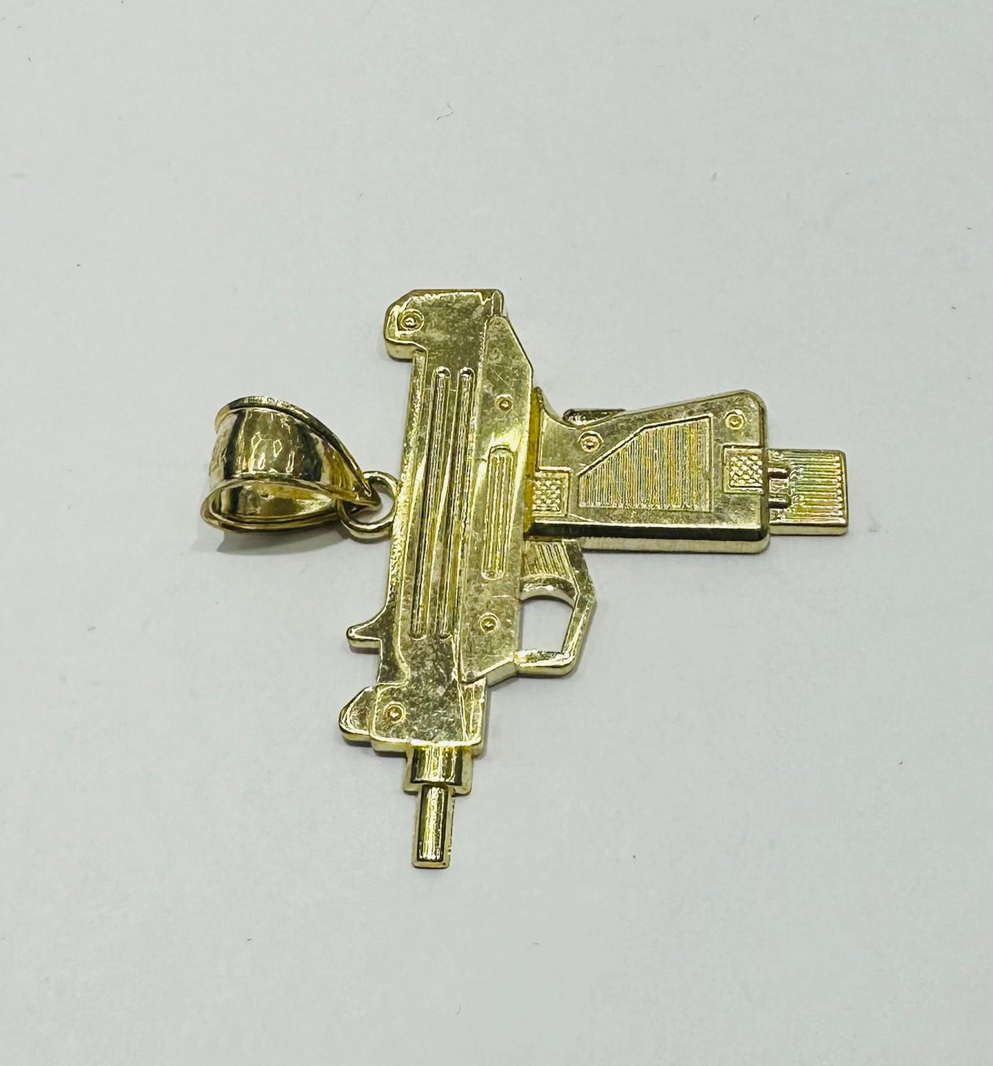 10K GOLD GUN PENDANT, WEIGHT: 4.0gm