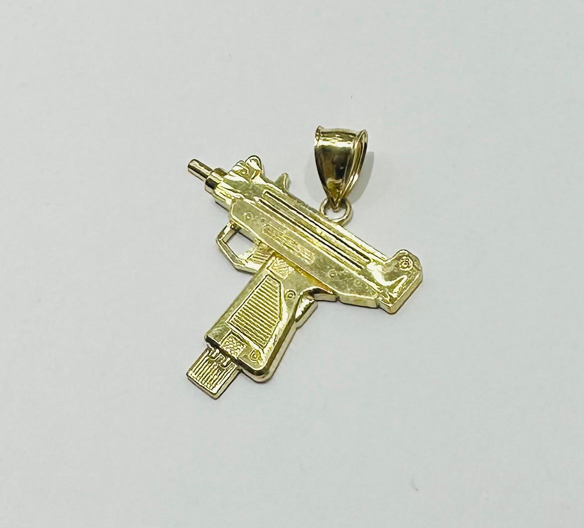 10K GOLD GUN PENDANT, WEIGHT: 4.0gm